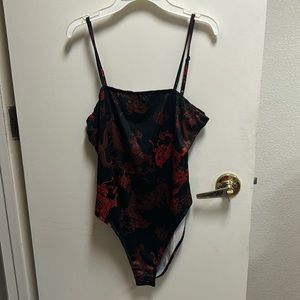 Black with red dragons bodysuit